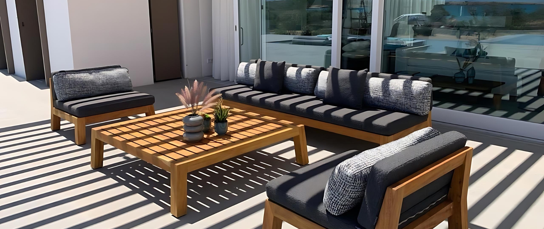 Luxury wooden outdoor lounge furniture, contract patio sofas, and hotel coffee tables by Grandeco